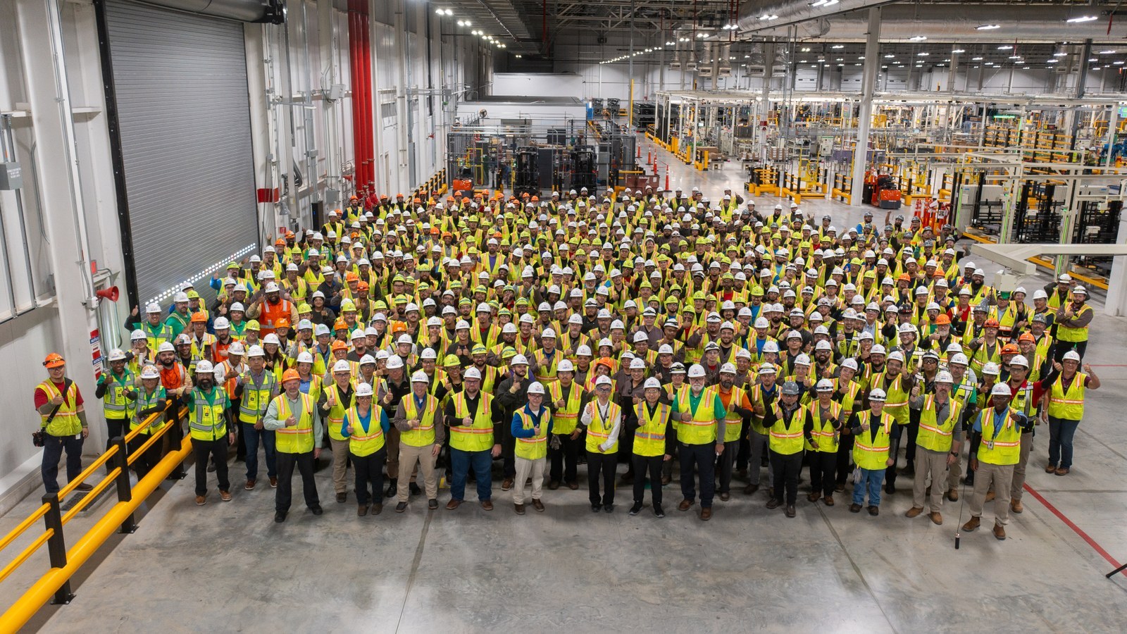 Hundreds of Toyota Texas workers in hard hats and safety vests