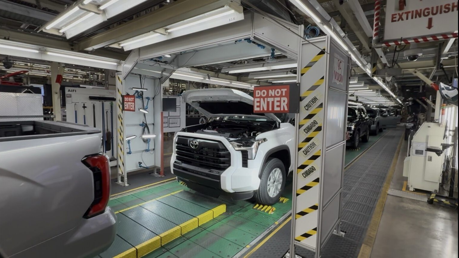 White Toyota Tundra in a camera inspection station at Toyota Texas