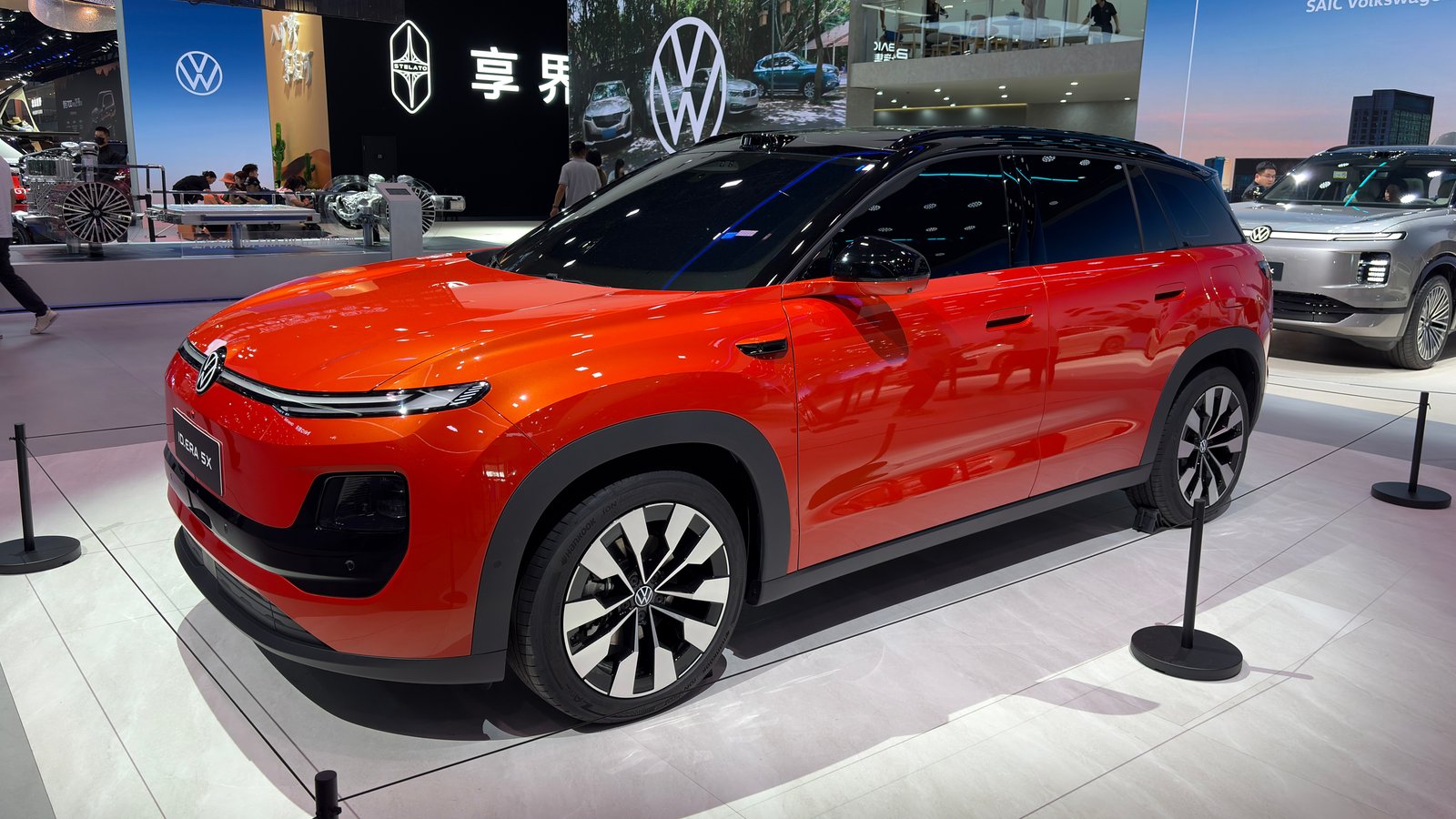 Volkswagen ID.ERA 5X with VW and Stelato logos behind it