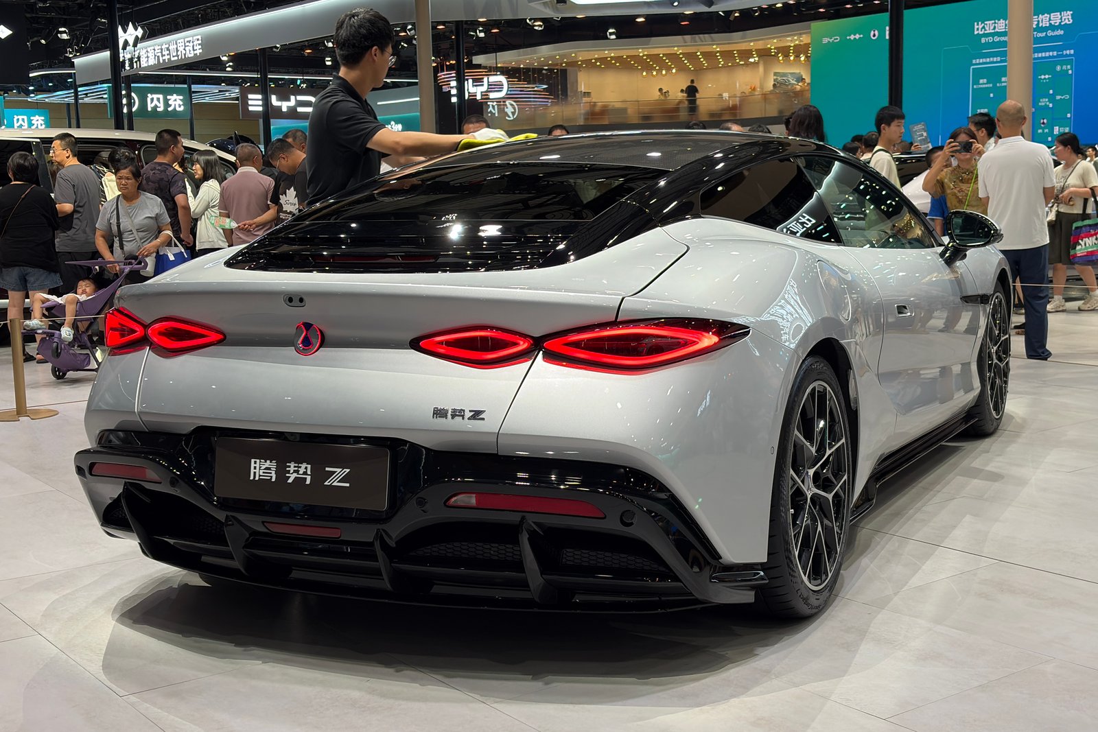 Rear view of the silver Denza Z Coupe on the show floor