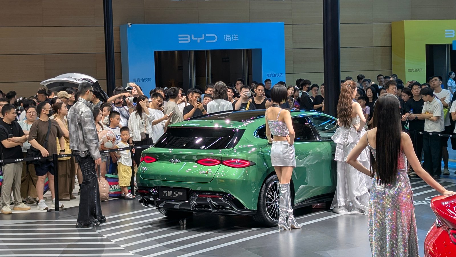 Crowd filming the Fangchengbao Formula S at BYD's Chengdu pavilion