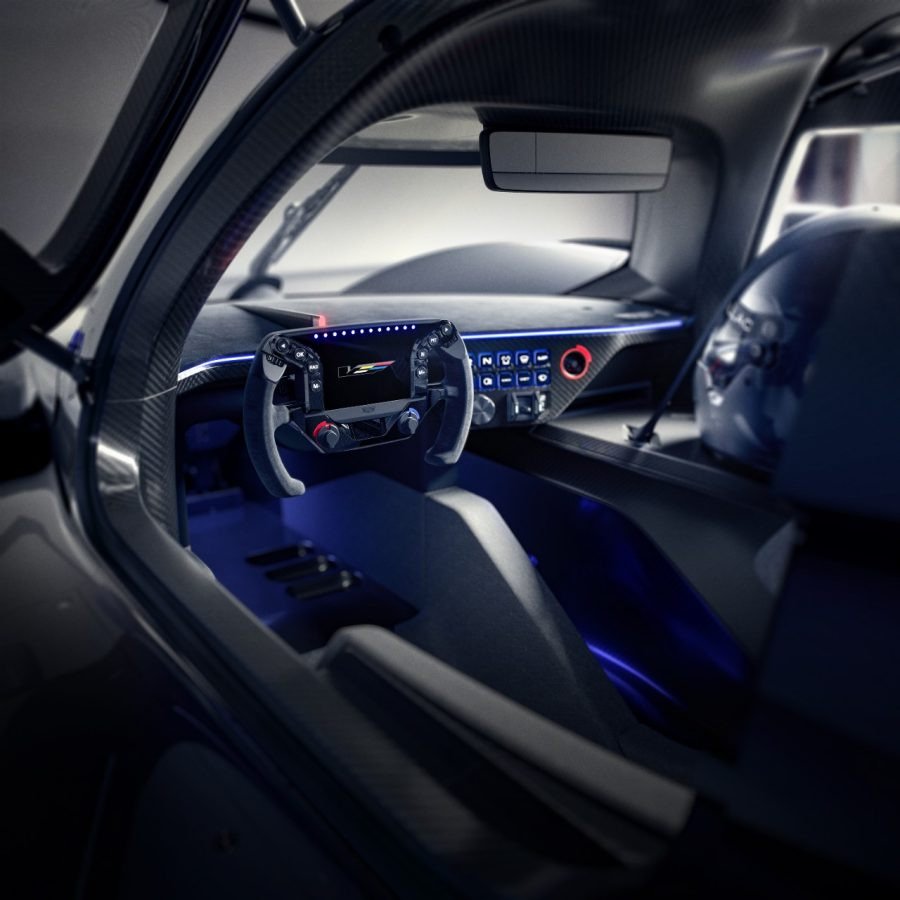 Cadillac V-ONE cockpit with display-equipped steering wheel and carbon-fiber dash