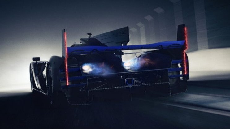 Cadillac V-ONE concept from the rear at speed, red lights on wing endplates