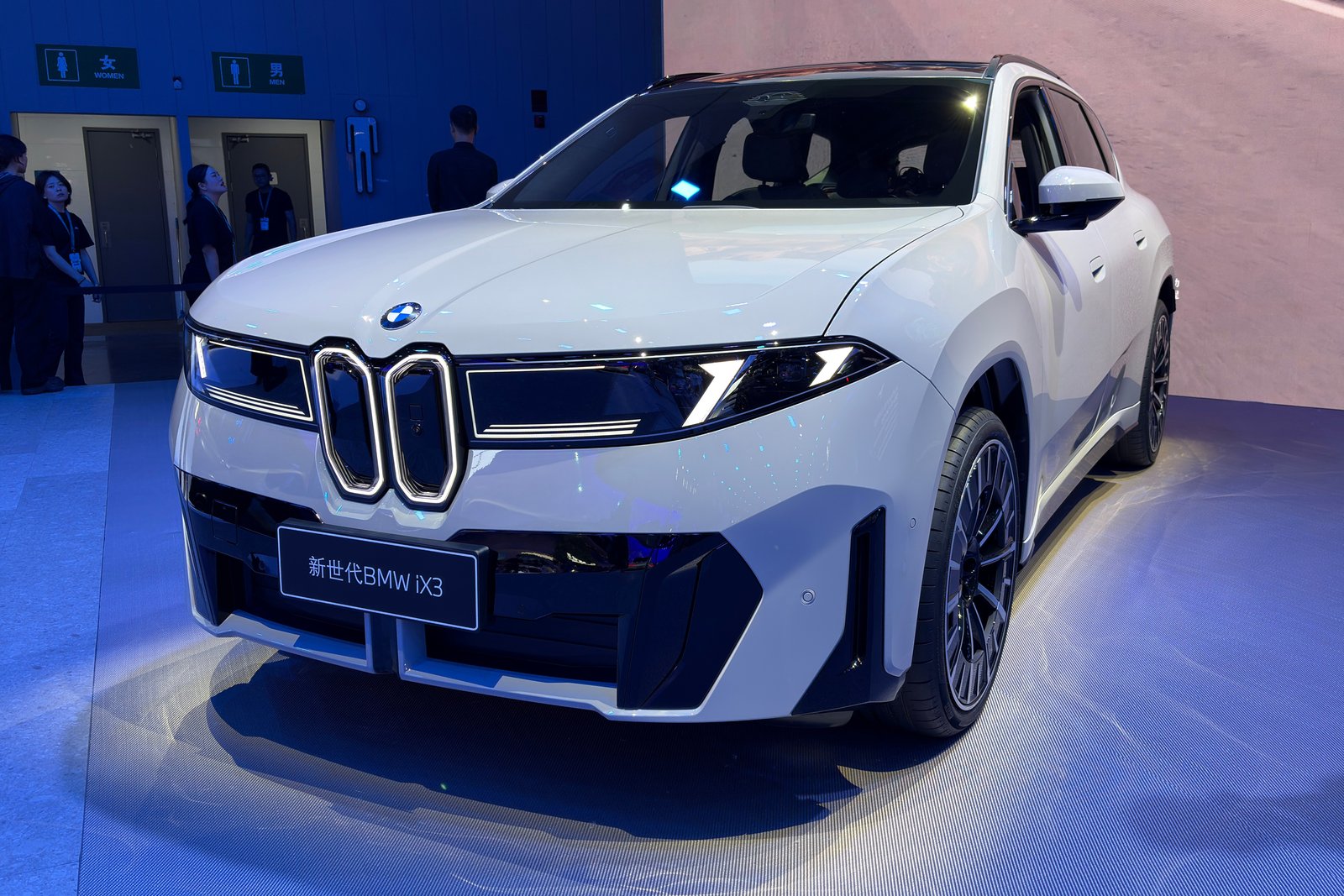 White BMW iX3 50L front three-quarter view at Chengdu Motor Show