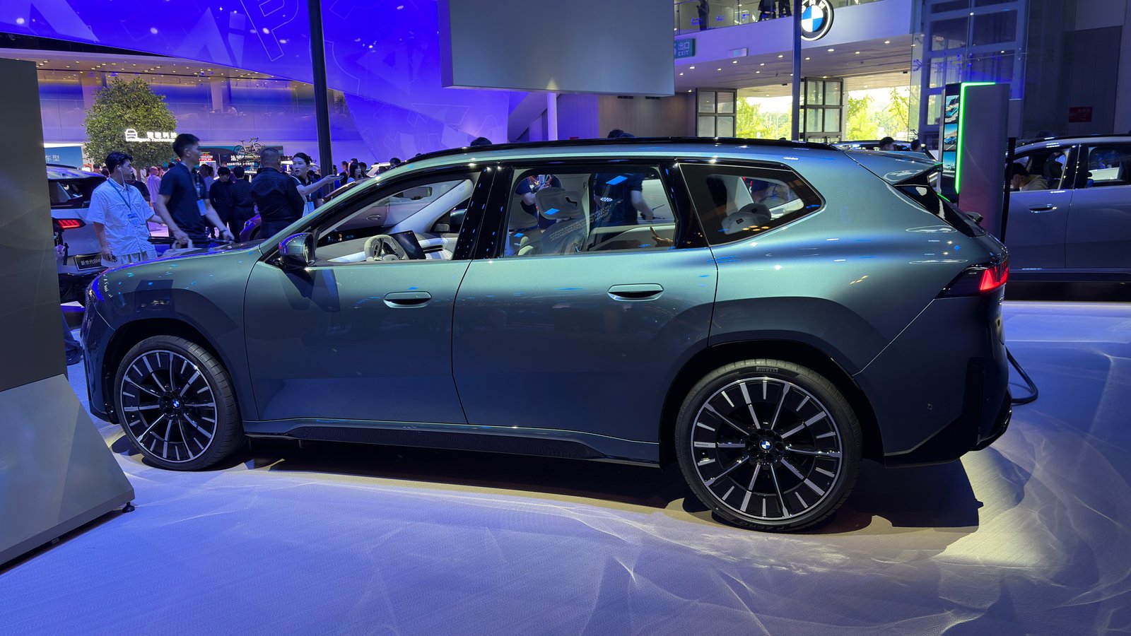 Dark BMW iX3 50L side profile showing long wheelbase