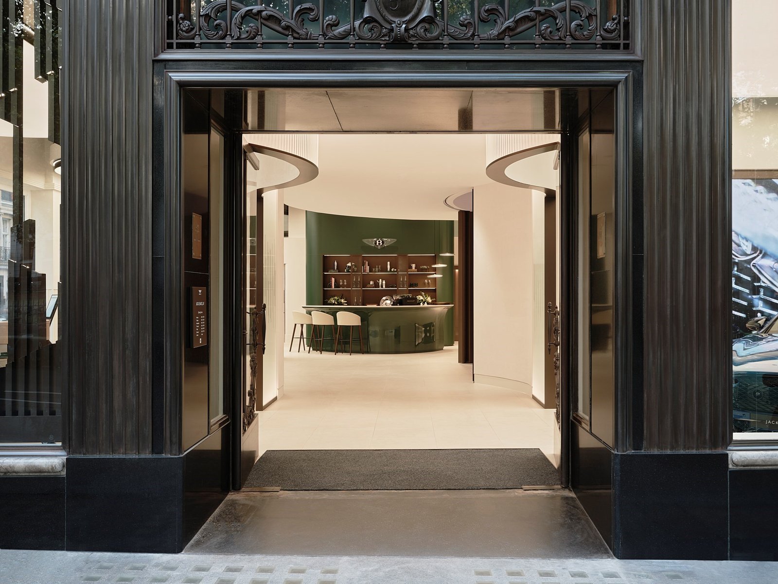 Entrance of Bentley Jack Barclay showroom looking through to the bar