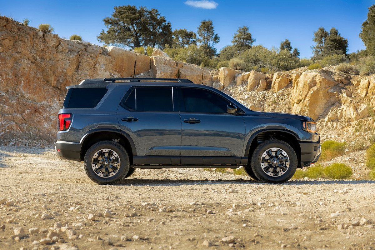 2027 Honda Passport TrailSport side profile showing raised ride height and fender flares