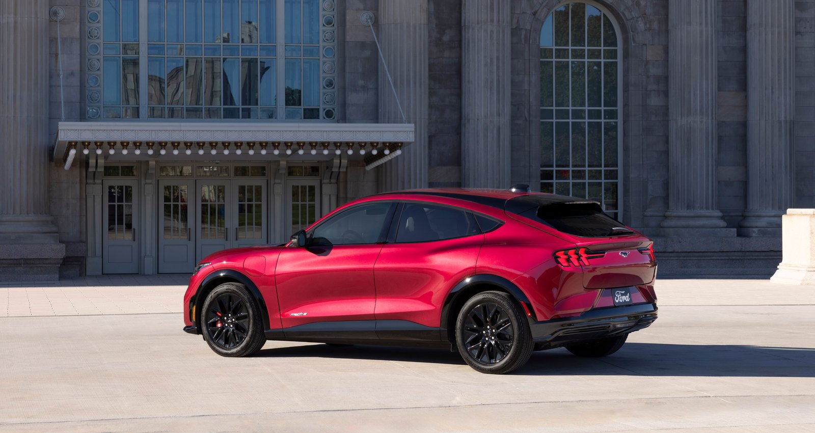 Red Ford Mustang Mach-E rear three-quarter view