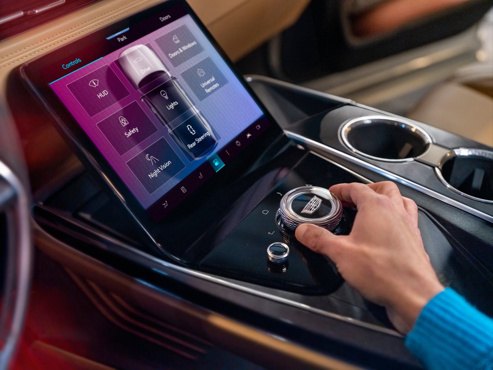 Escalade IQ lower control touchscreen with rotary controller and vehicle settings