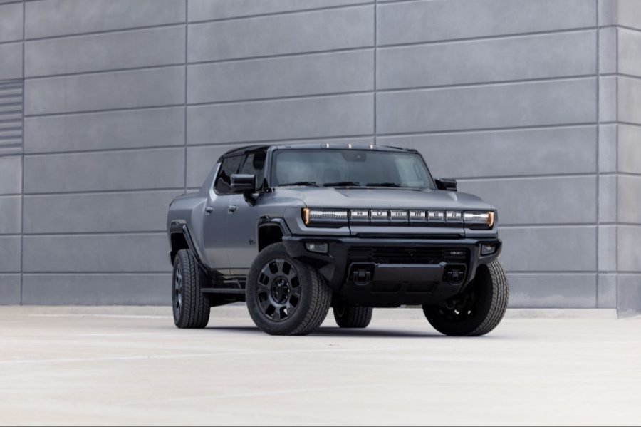 2026 GMC HUMMER EV Pickup Carbon Fiber Edition in gray matte paint, front three-quarter view