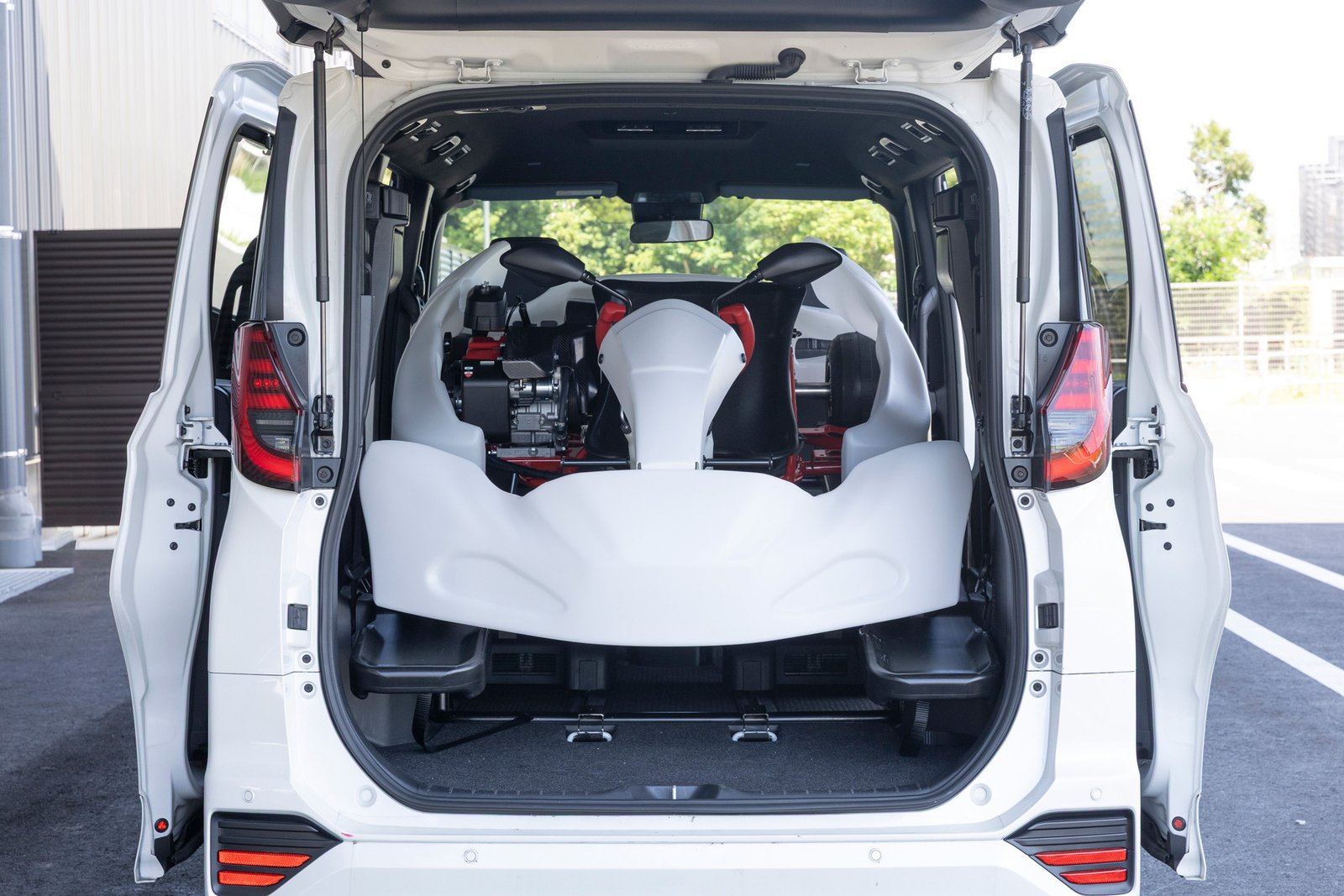 GR KART loaded in the cargo area of a Toyota Noah minivan