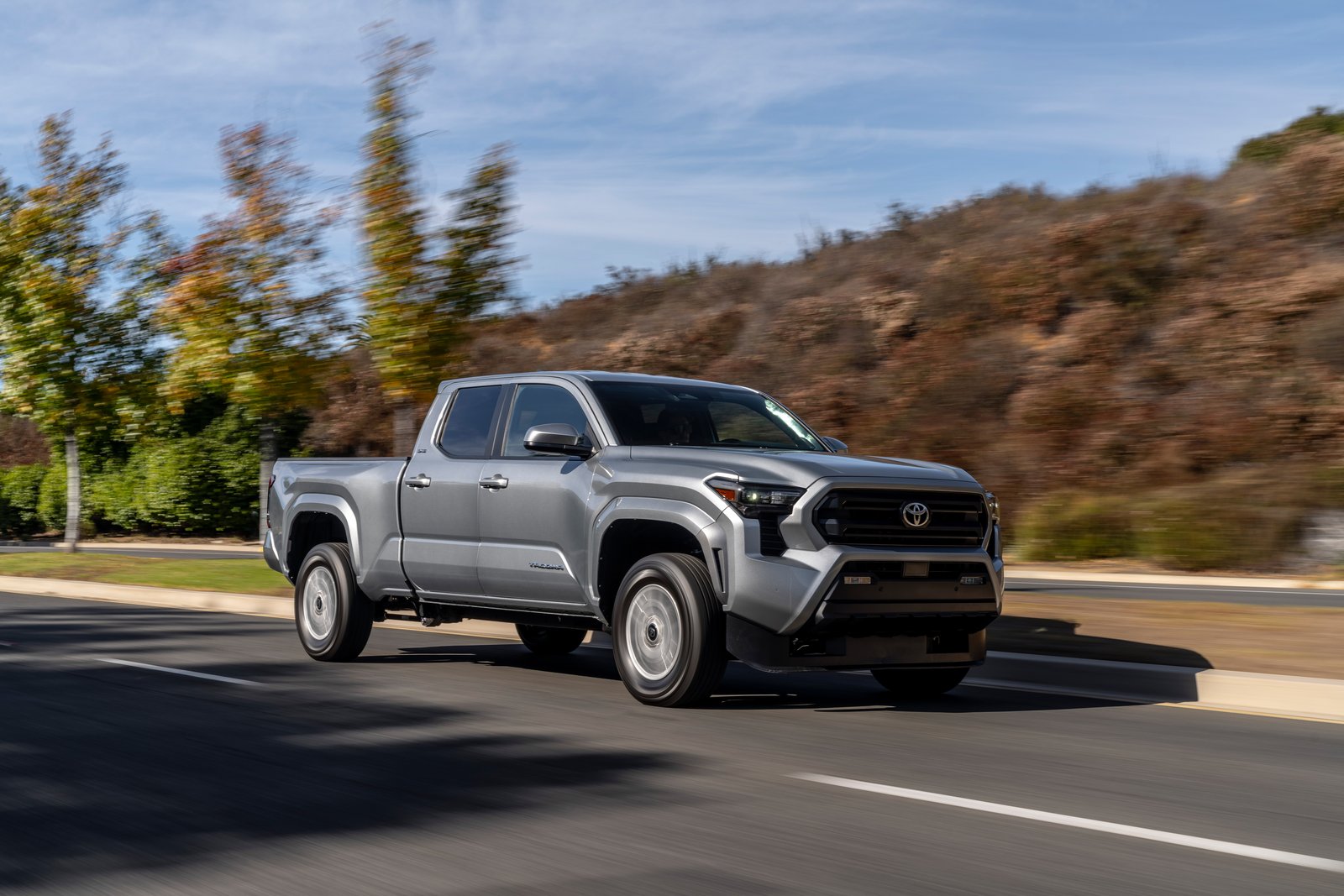 2026 Toyota Tacoma SR5 Double Cab driving on a highway