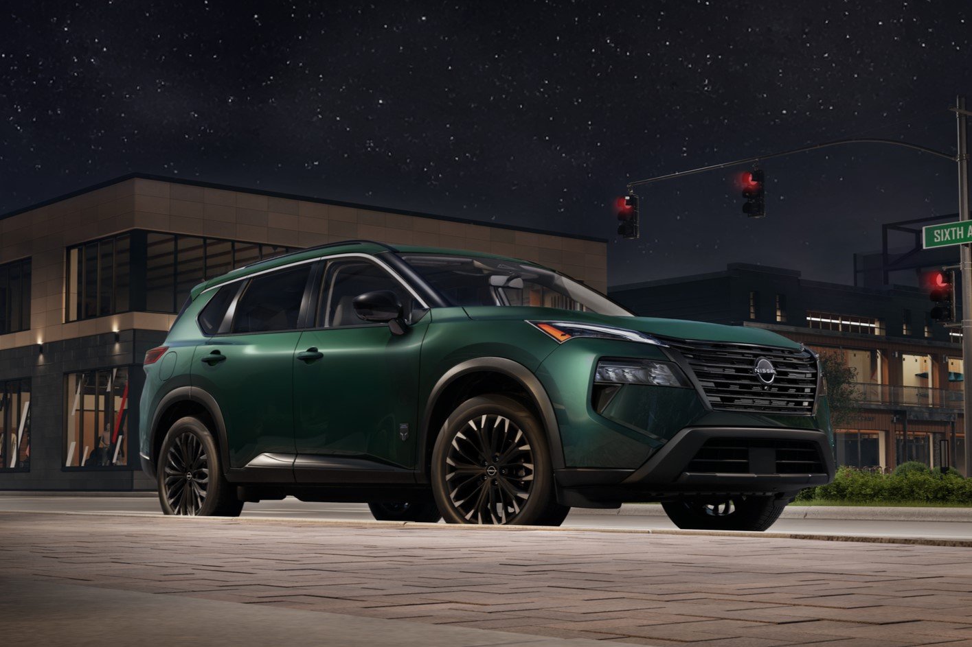 2027 Nissan Rogue Dark Armor in green at night with black wheels