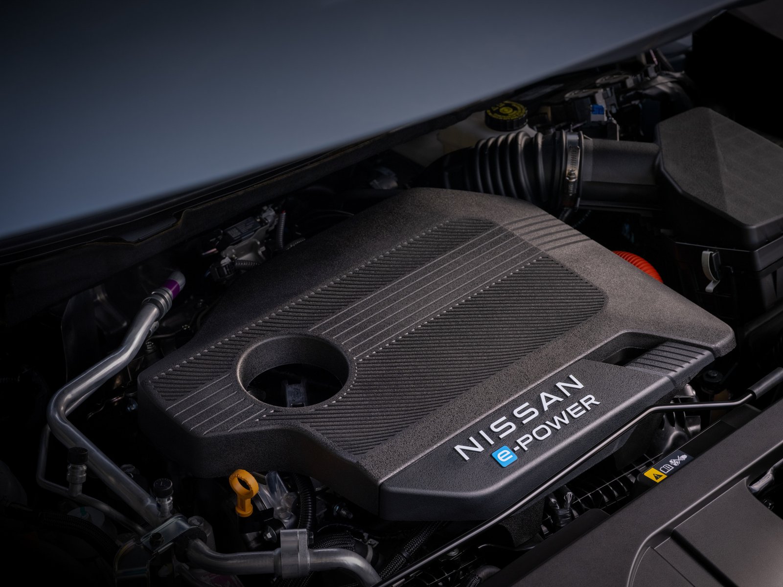 Nissan e-POWER engine cover under the hood of the 2027 Rogue Hybrid