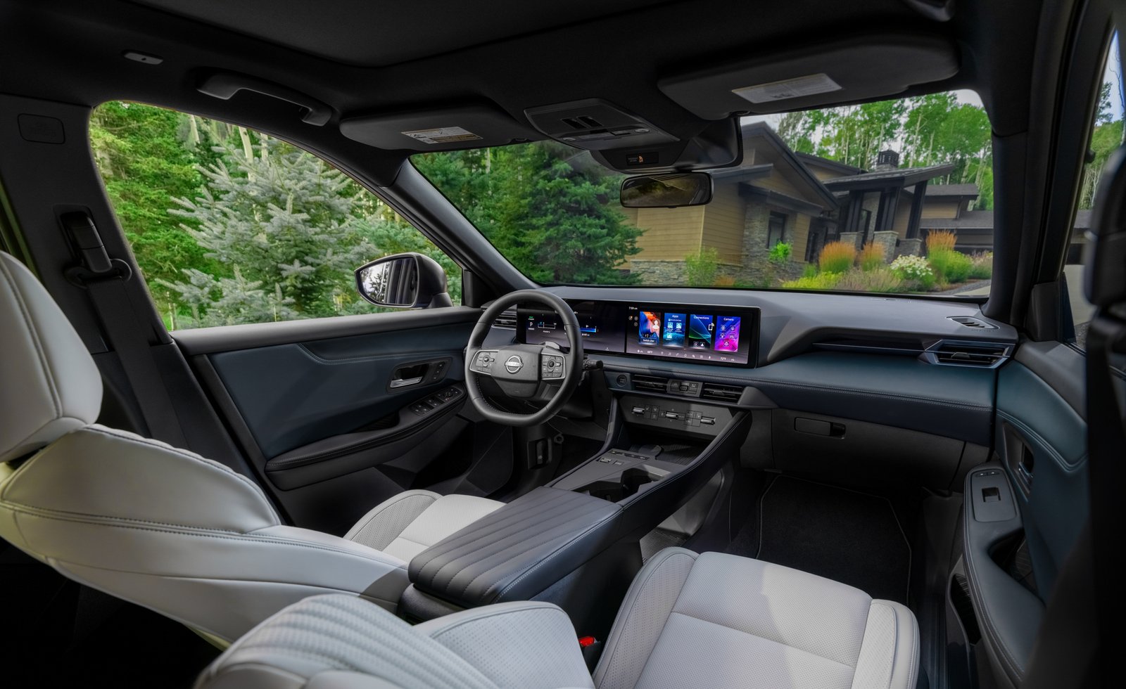 2027 Nissan Rogue Hybrid interior with dual displays and two-tone upholstery