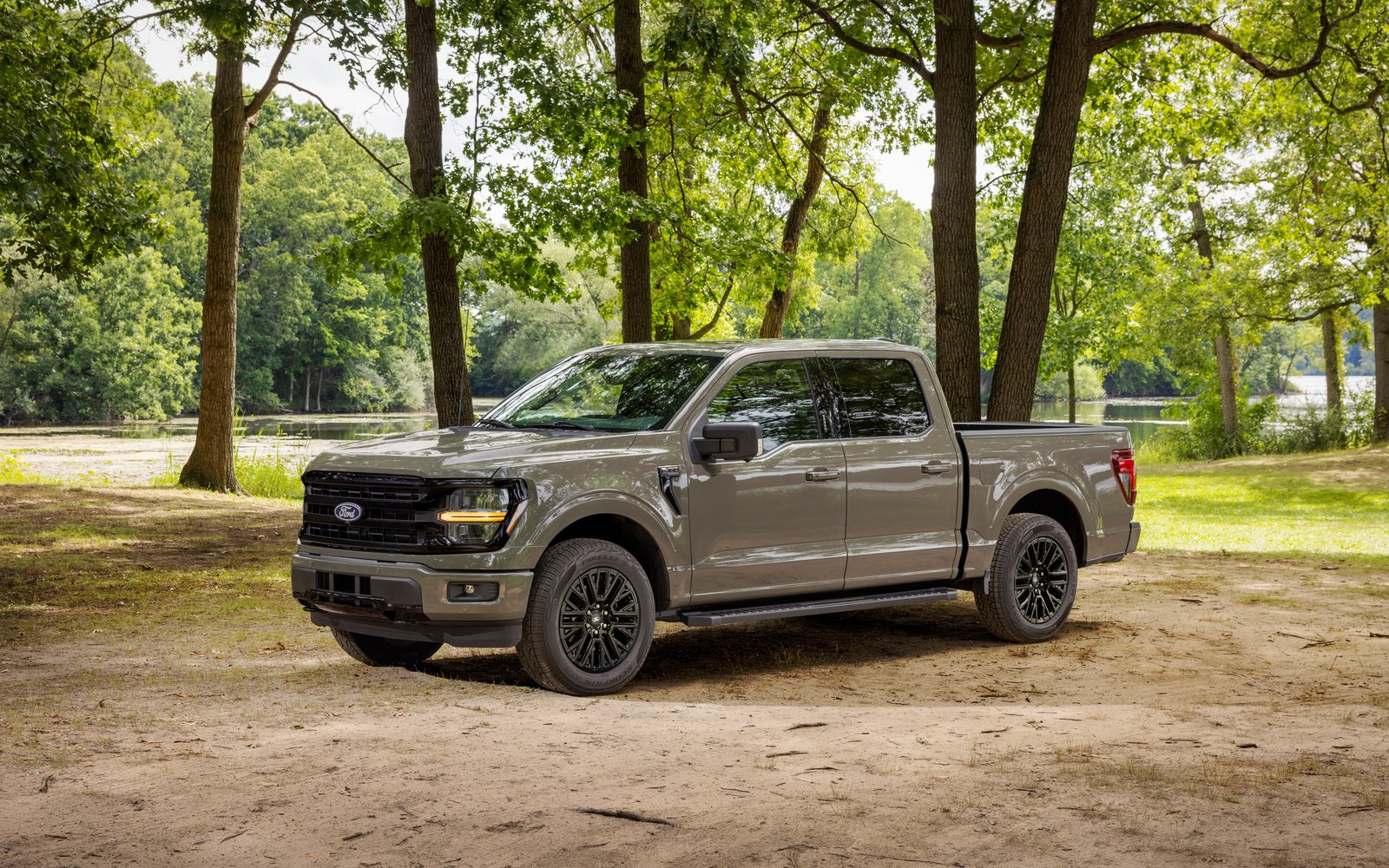 2027 Ford F-150 XLT front three-quarter view with redesigned grille