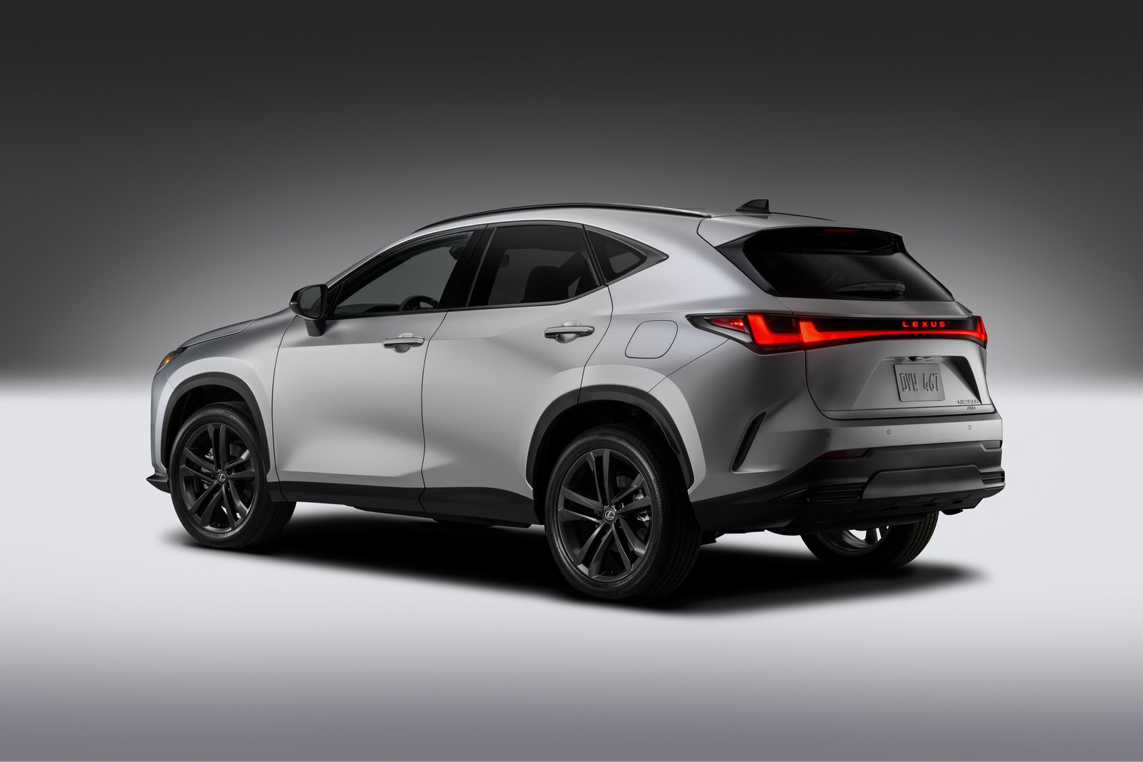 2027 Lexus NX 350h AWD rear three-quarter view with full-width light bar