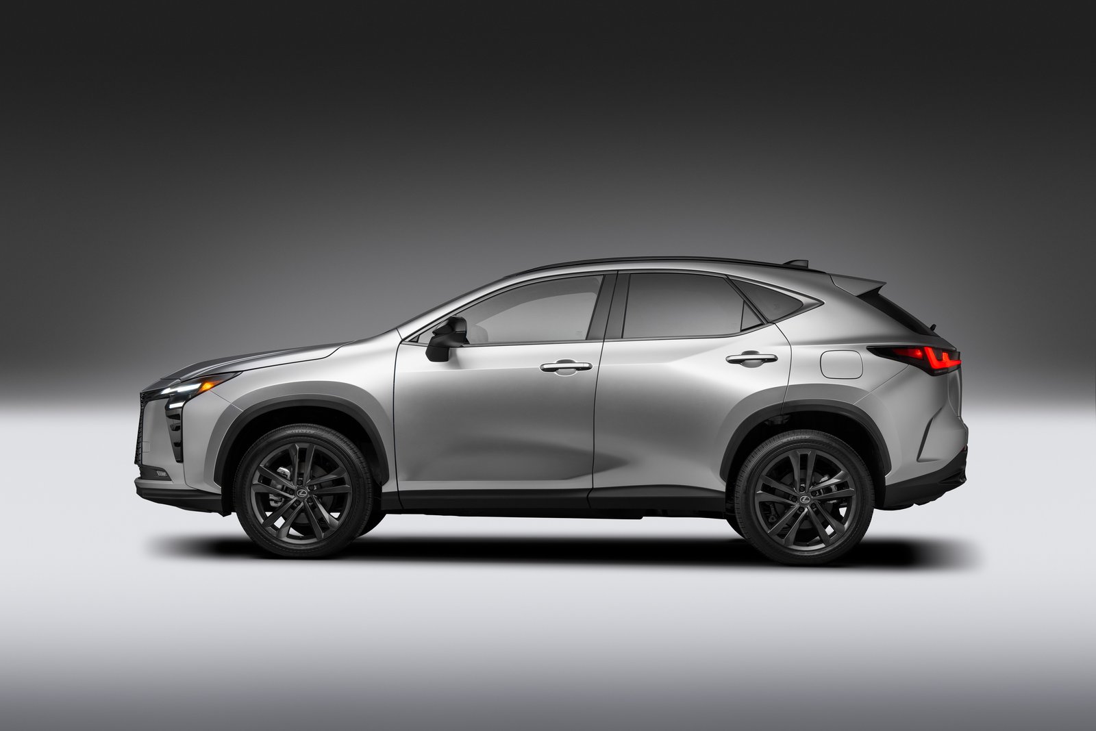 2027 Lexus NX 350h AWD side profile with dark wheels