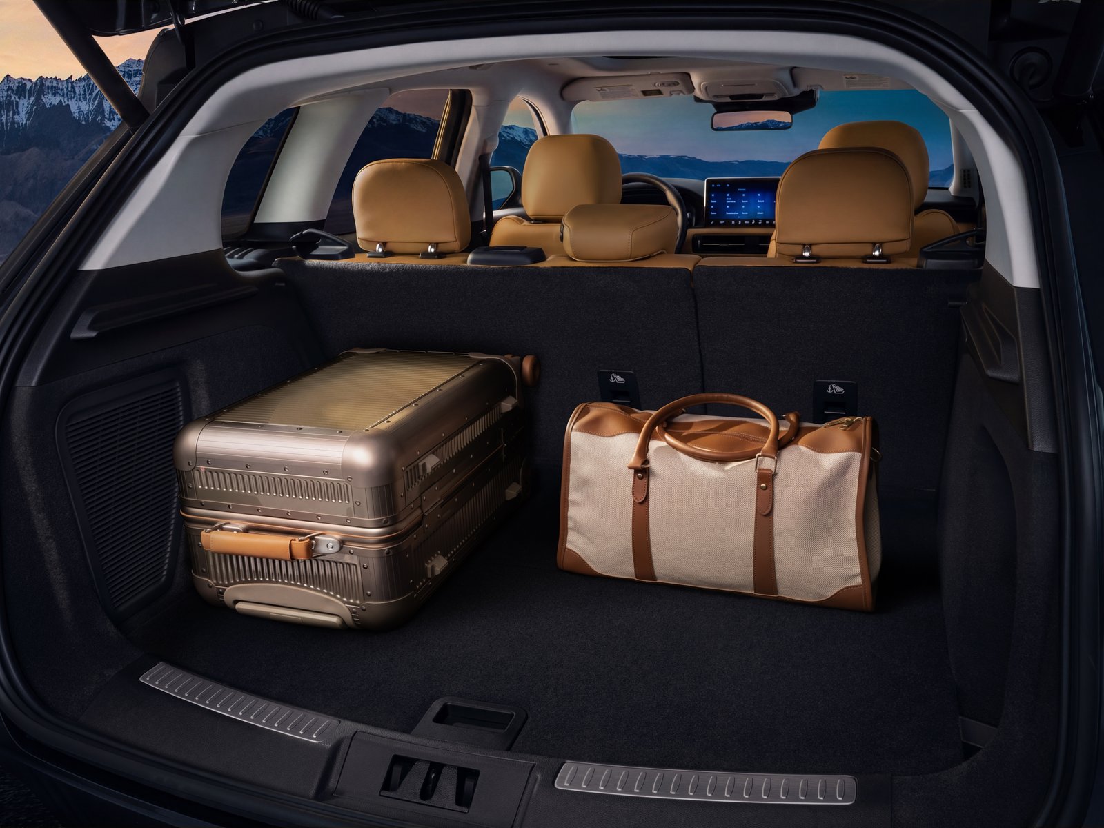 Cargo area of the 2027 Lincoln Corsair Hybrid with luggage