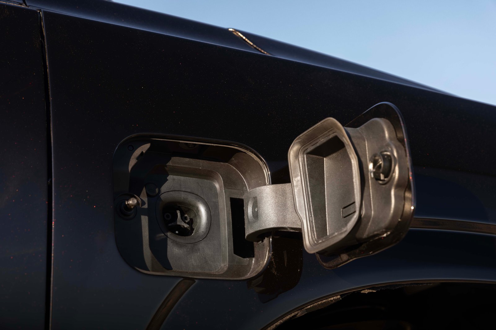 Open NACS charging port on the Subaru Getaway