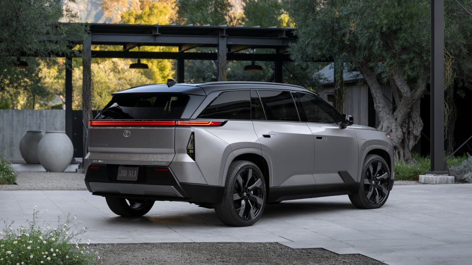 Rear three-quarter view of the 2028 Toyota Highlander electric SUV