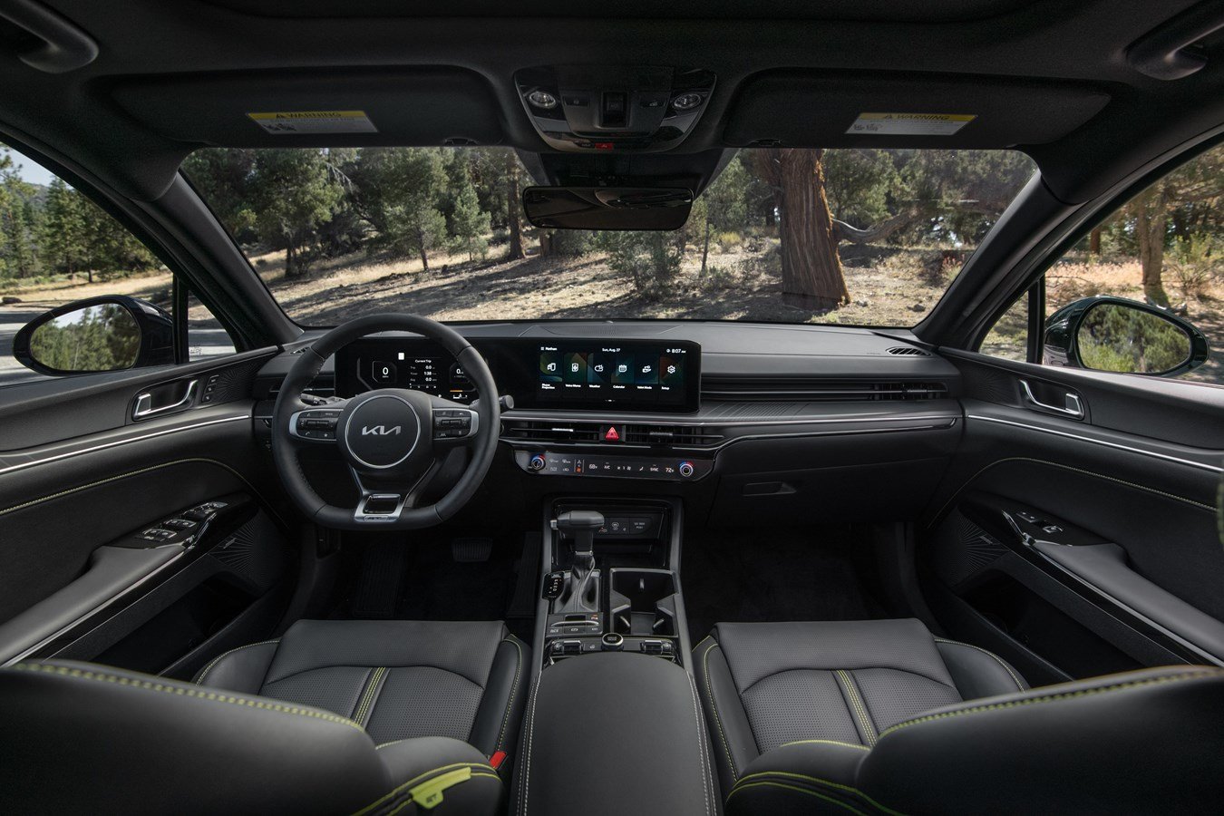 2027 Kia K5 dashboard with wide dual-screen display and center console