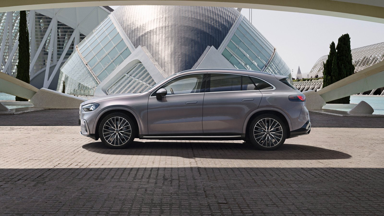 Side profile of the Mercedes GLC 400 4MATIC Electric parked under a bridge