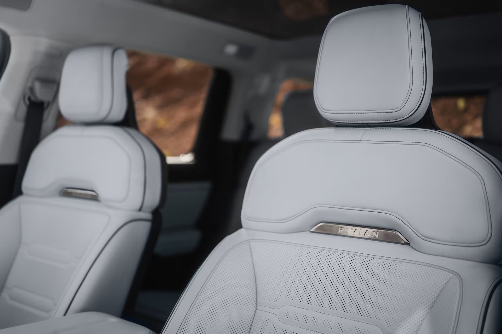 Light gray Coastal Cloud Signature front seats in the Rivian R2