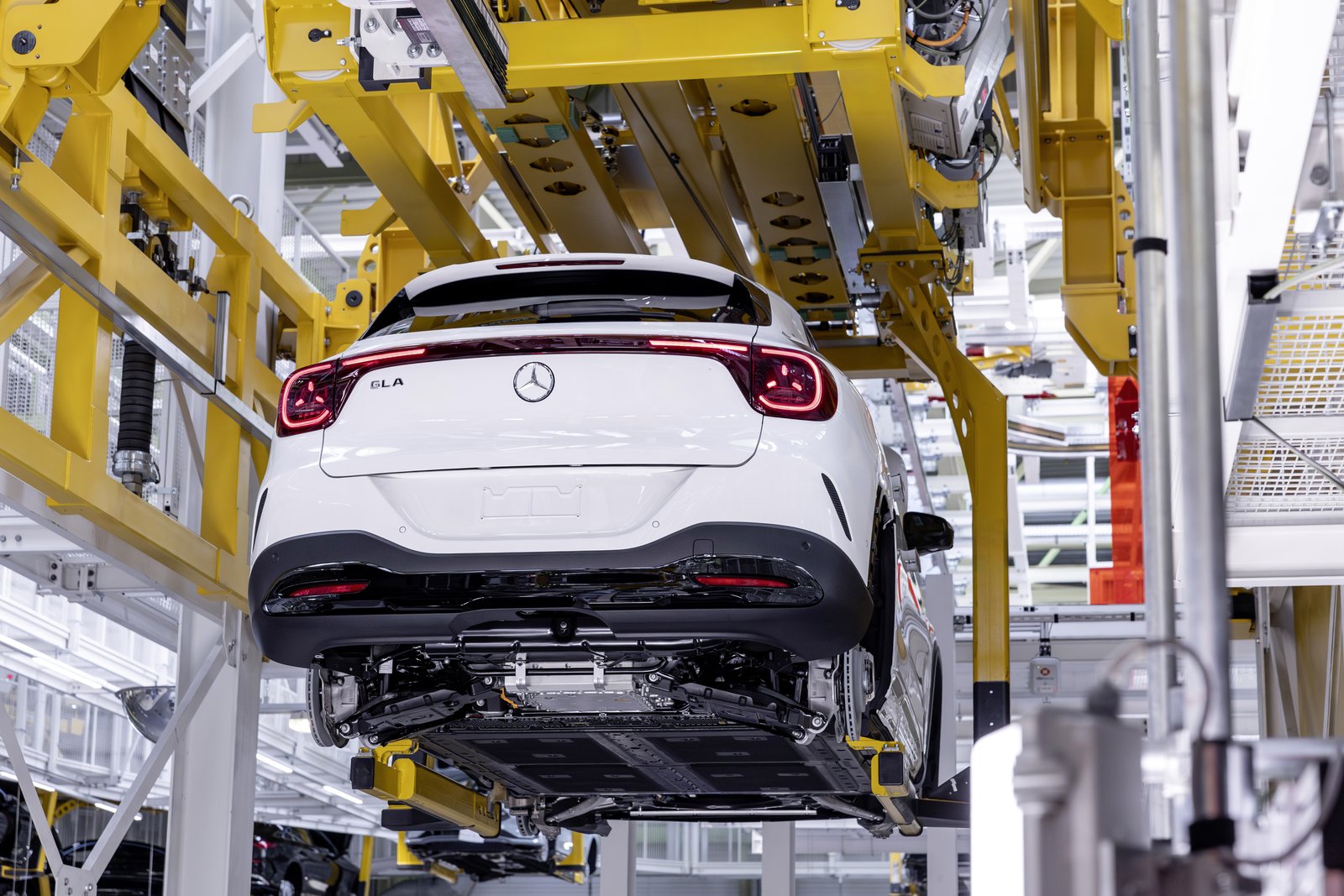 Rear view of white Mercedes GLA showing flat battery underbody