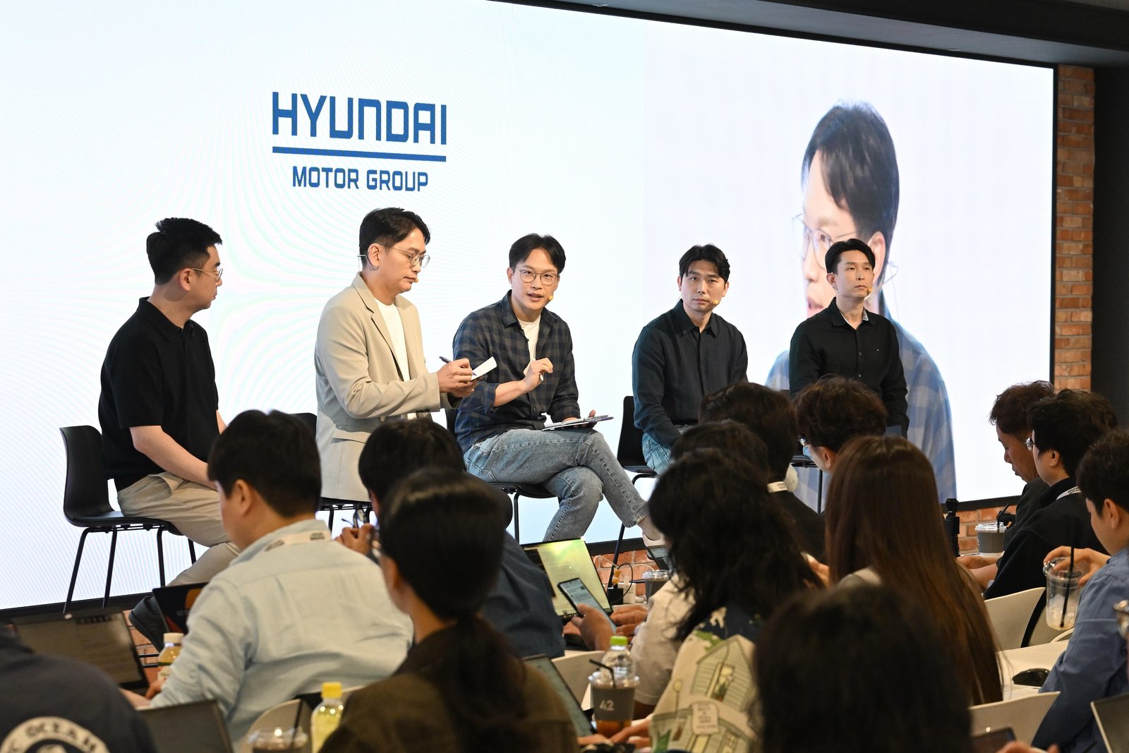 Hyundai executive presenting autonomous driving roadmap at Media Day
