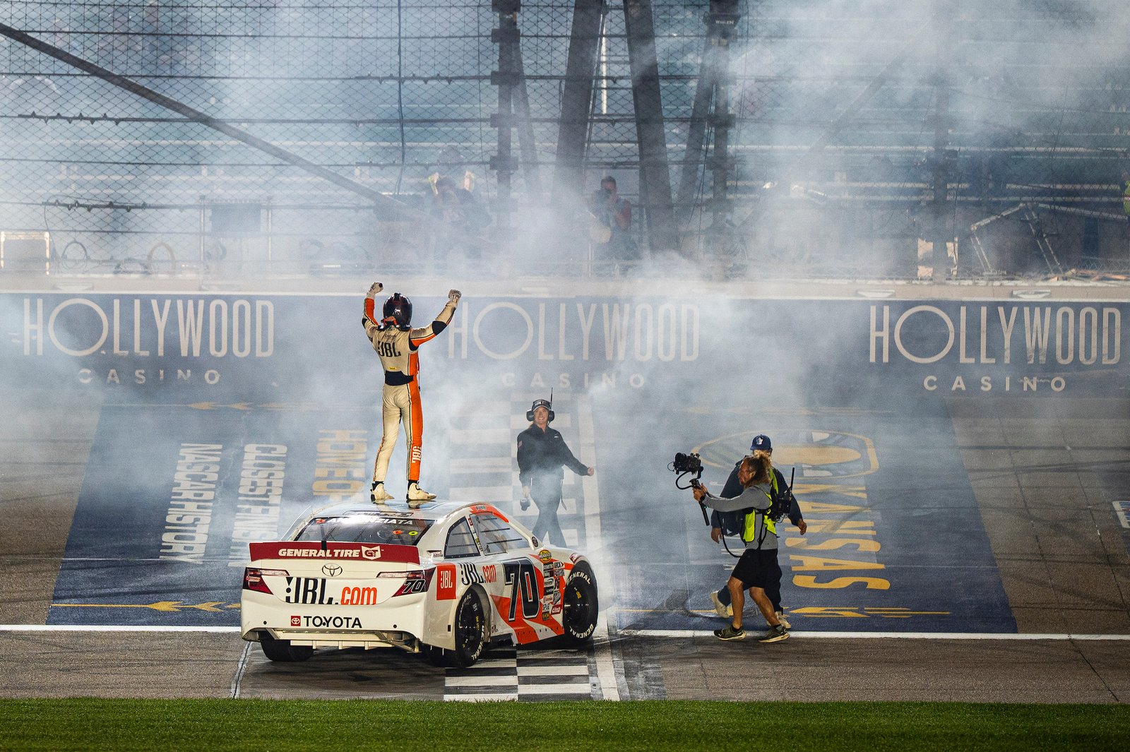 Thomas Annunziata celebrating on the roof of his Camry at Kansas