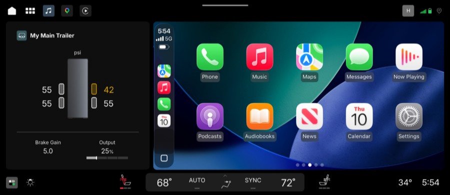 Apple CarPlay card next to trailer tire pressure display in GM interface