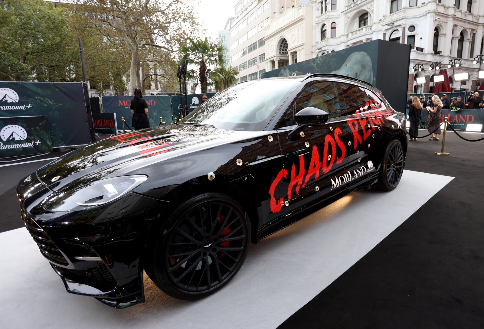 Aston Martin DBX with Chaos Reigns livery at MobLand premiere in London
