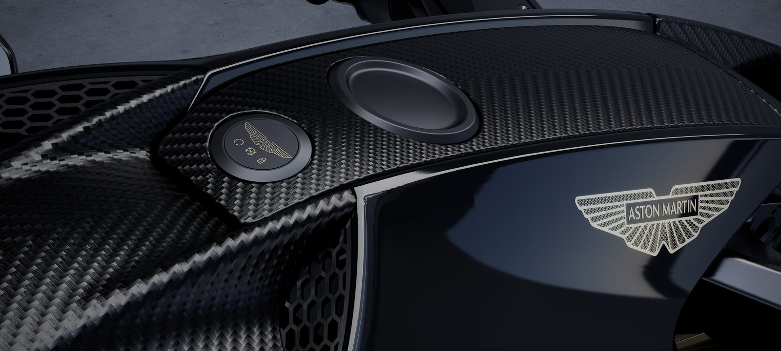 Carbon fiber fuel tank of AMB 002 with Aston Martin wings badge