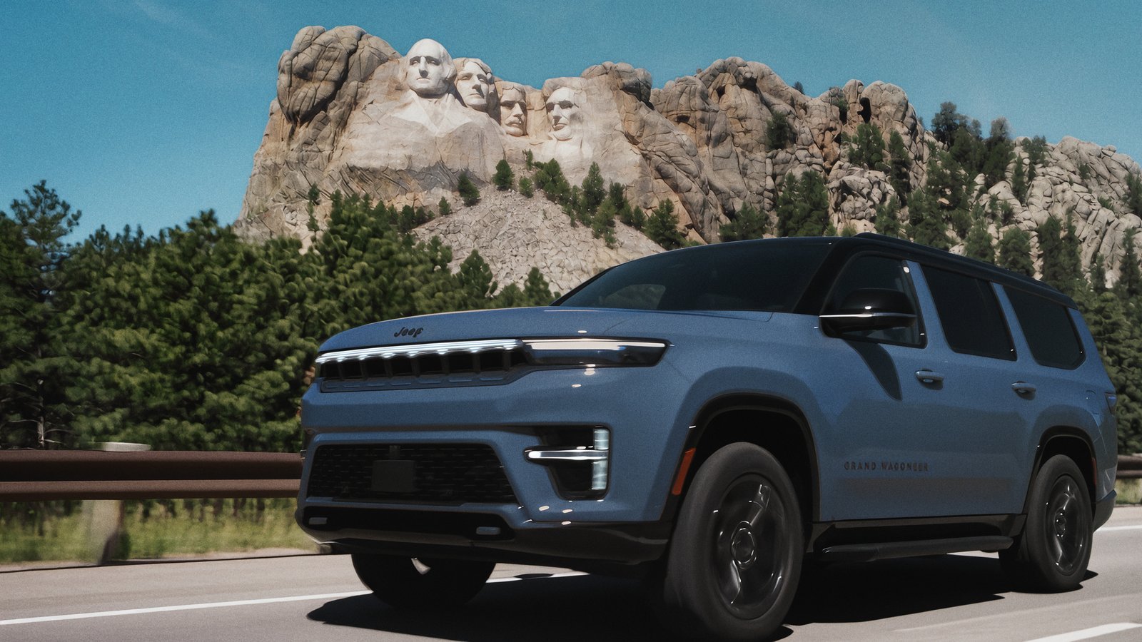 Jeep Grand Wagoneer driving past Mount Rushmore