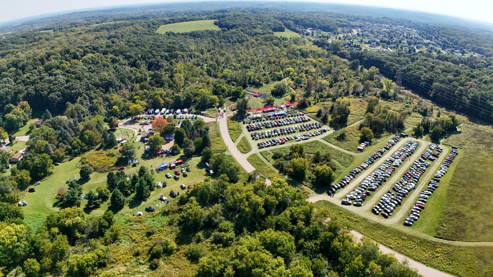 Aerial view of a packed NICA league race venue in Wisconsin