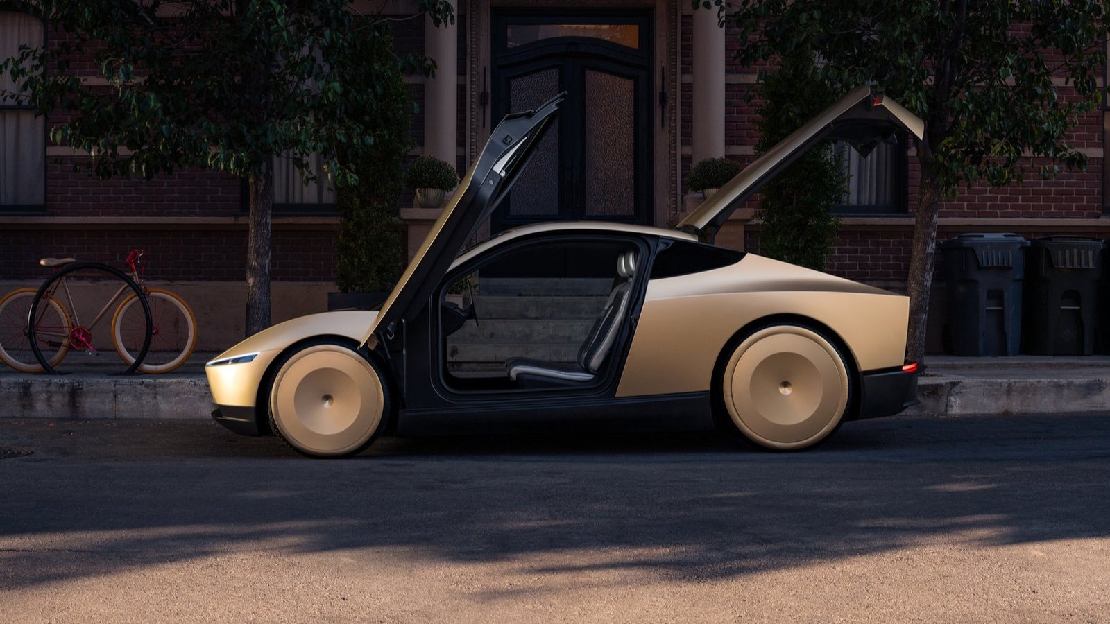 Tesla Cybercab parked with both butterfly doors open, showing the B-pillar between them