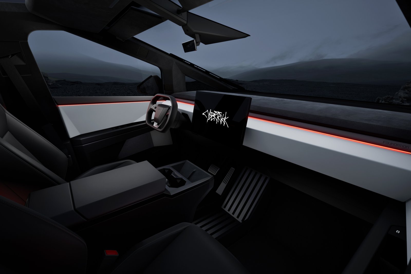Tesla Cybertruck interior with the center touchscreen and yoke-style steering wheel