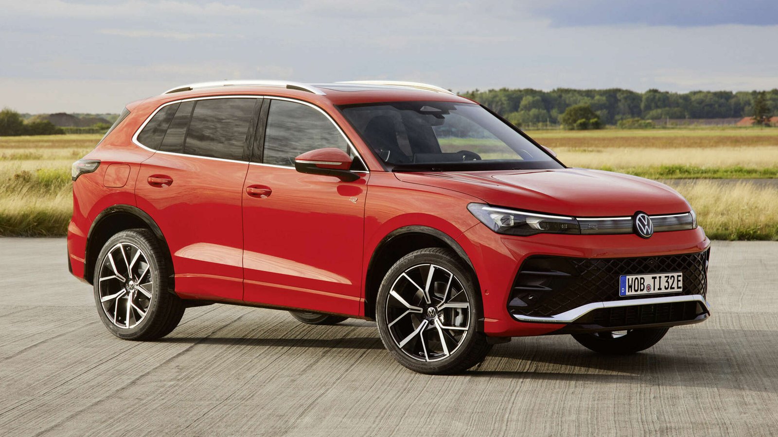 hird-generation Volkswagen Tiguan front three-quarter view on airfield