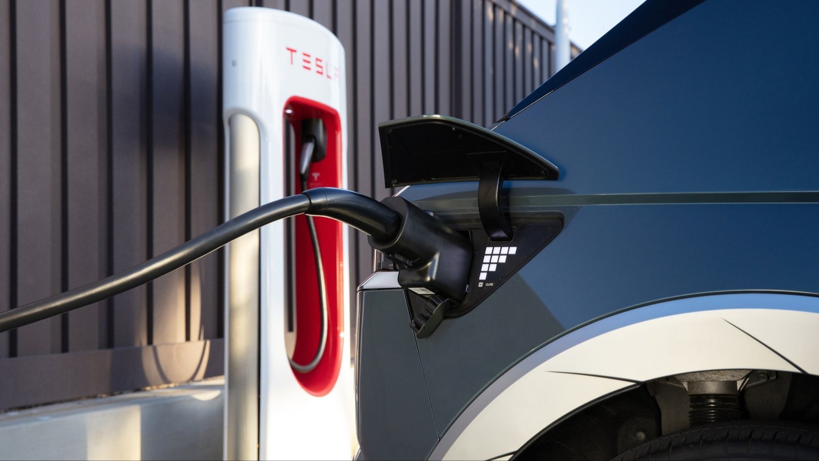 Hyundai NACS adapter connecting a 2024 Ioniq 5 to a Tesla Supercharger