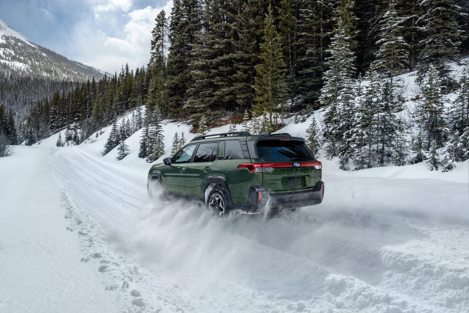 2026 Subaru Outback rear view driving through deep snow