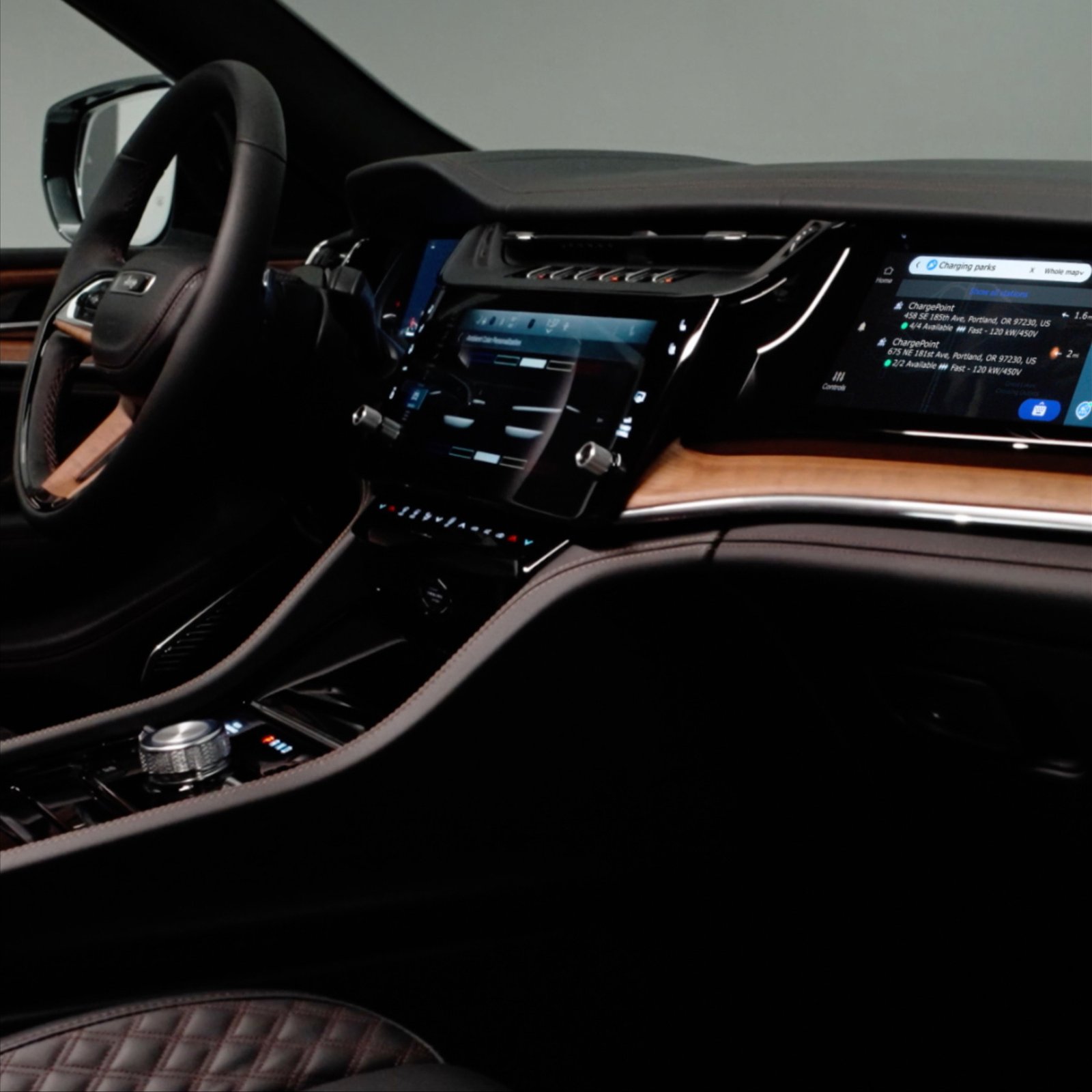 2026 Jeep Grand Cherokee interior with digital instrument cluster and touchscreens