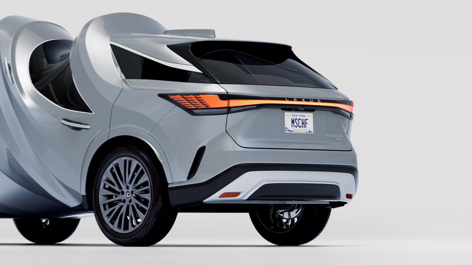 Rear of Twisted Car showing RX 450h+ badge and MSCHF plate