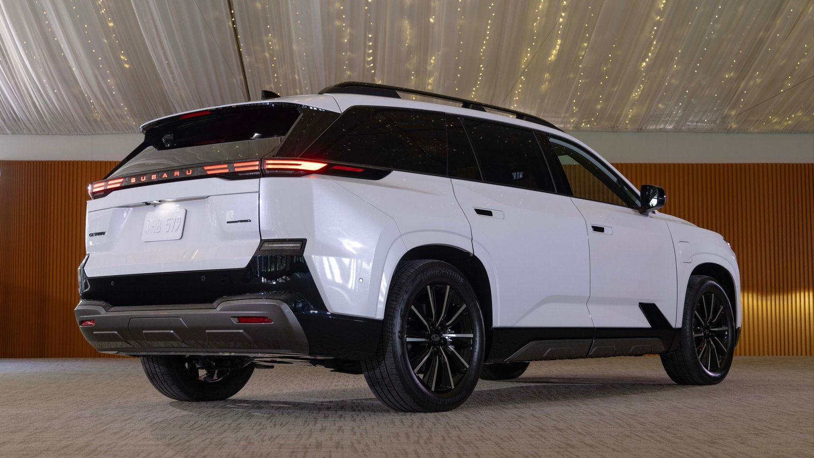 Rear three-quarter view of a white Subaru Getaway at its New York reveal