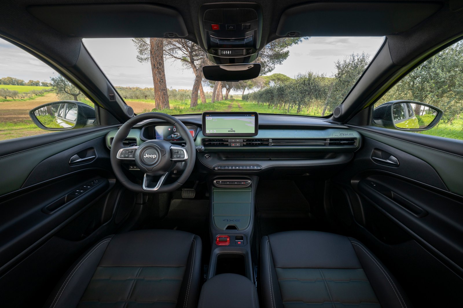 Jeep Avenger 4xe interior with 10.25-inch touchscreen and topographic dashboard trim