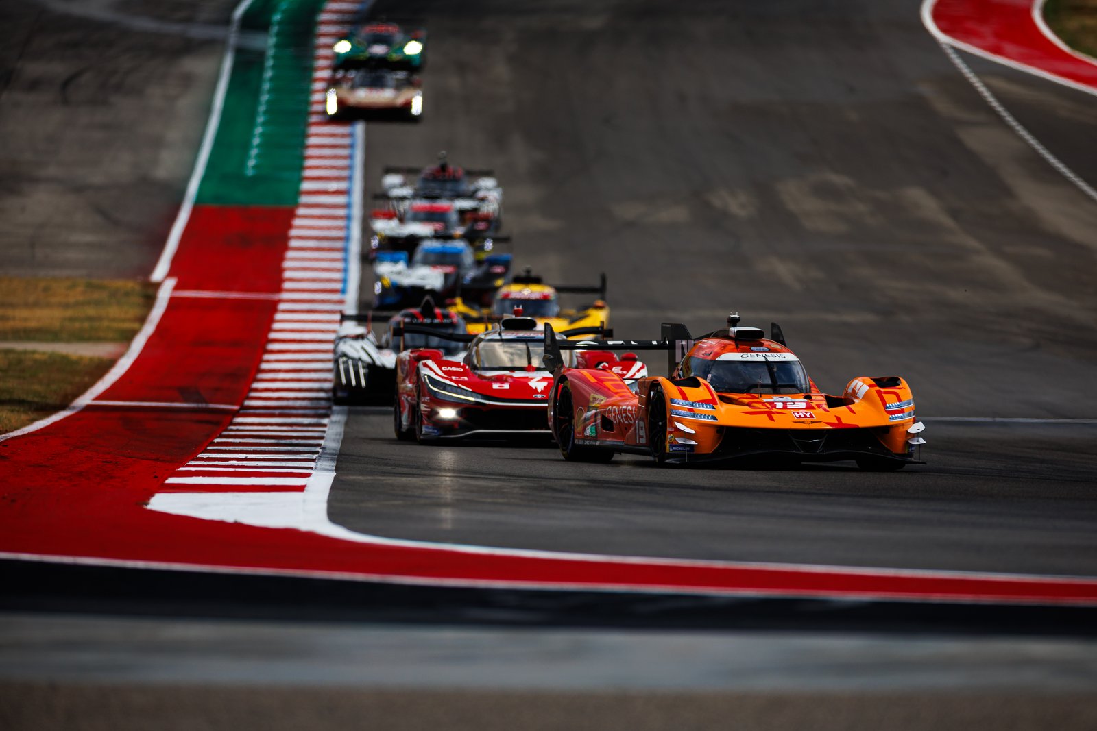 Genesis #19 leads Toyota and a train of Hypercars at COTA