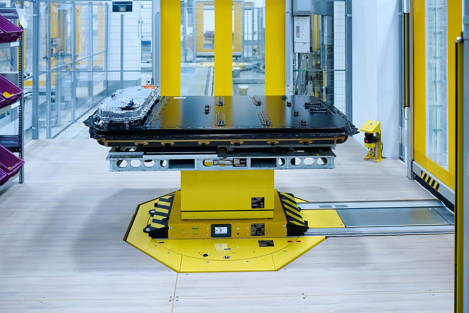 BMW Gen6 battery pack side view on automated production carrier