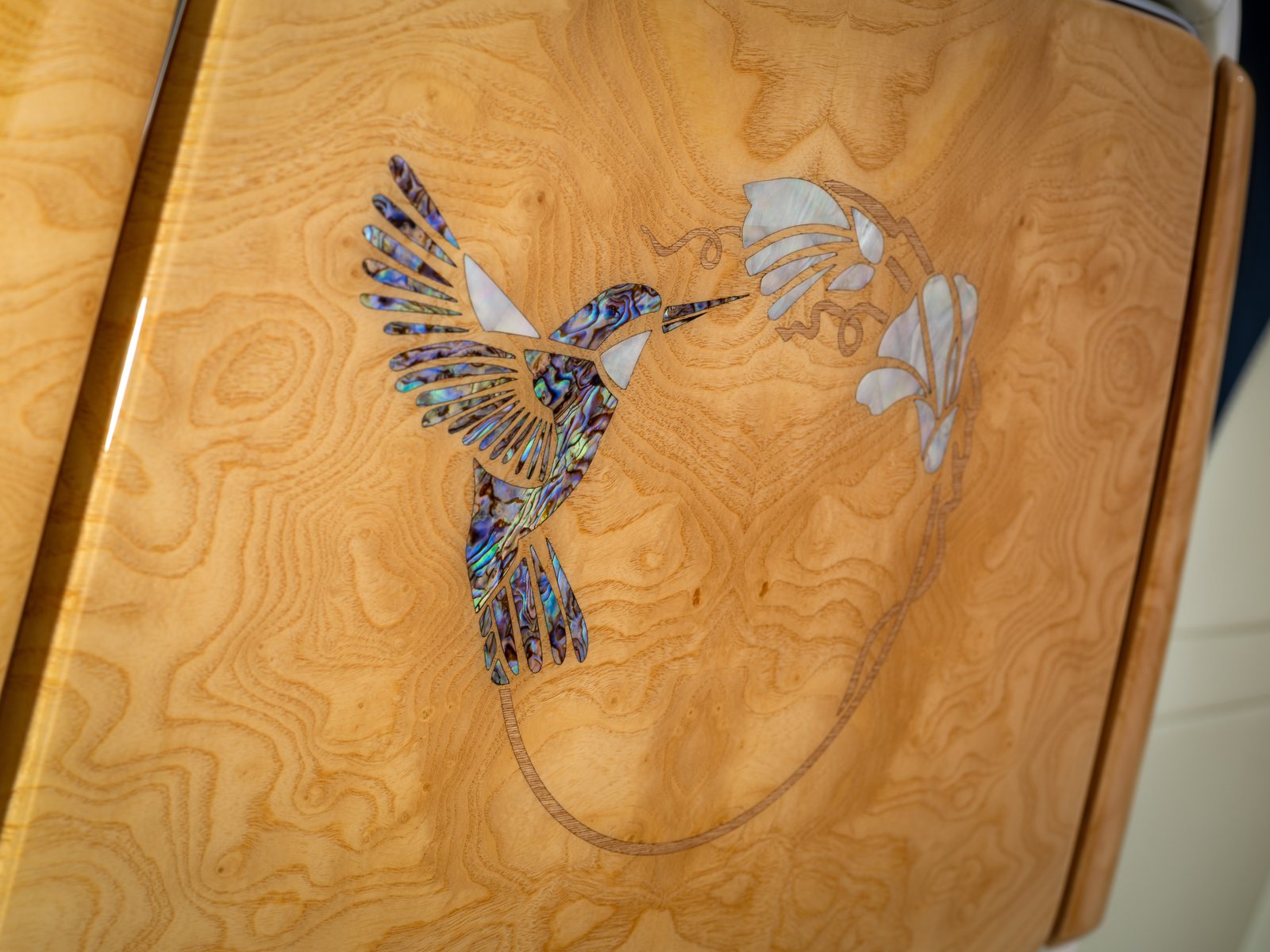 Abalone and mother-of-pearl hummingbird marquetry on Phantom picnic table