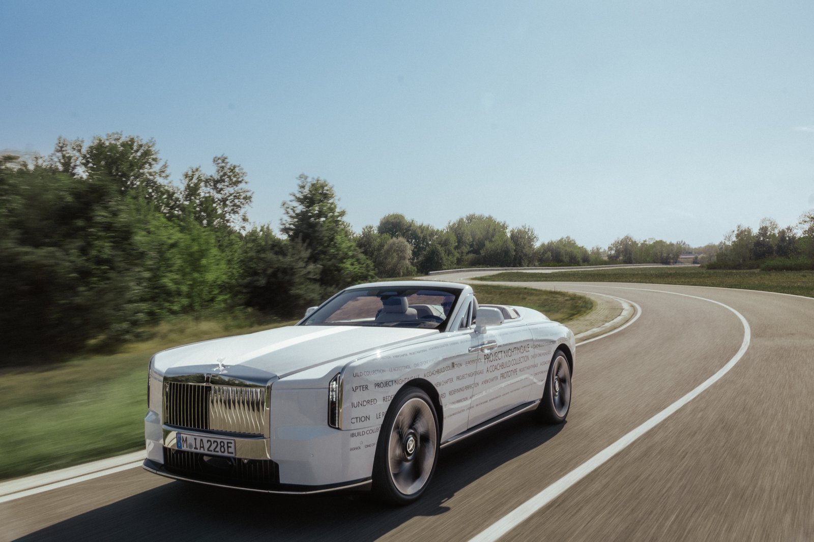 Black Project Nightingale prototype driving top-down on a test road