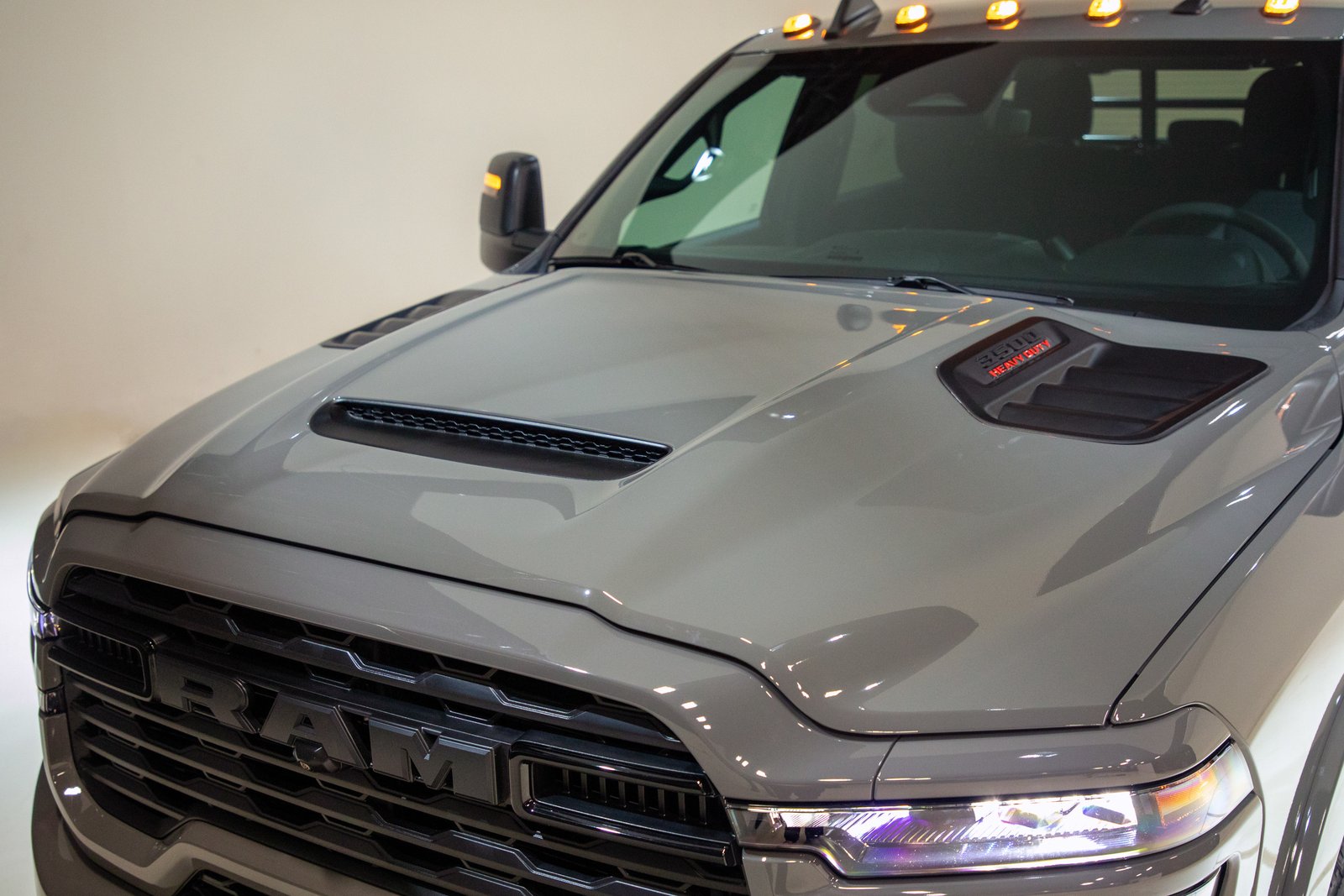 Sport hood with center scoop and 3500 Heavy Duty badge on the Ram Chassis Cab Night Edition